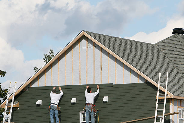 Professional Emergency Siding Repair technician working in Melville, NY
